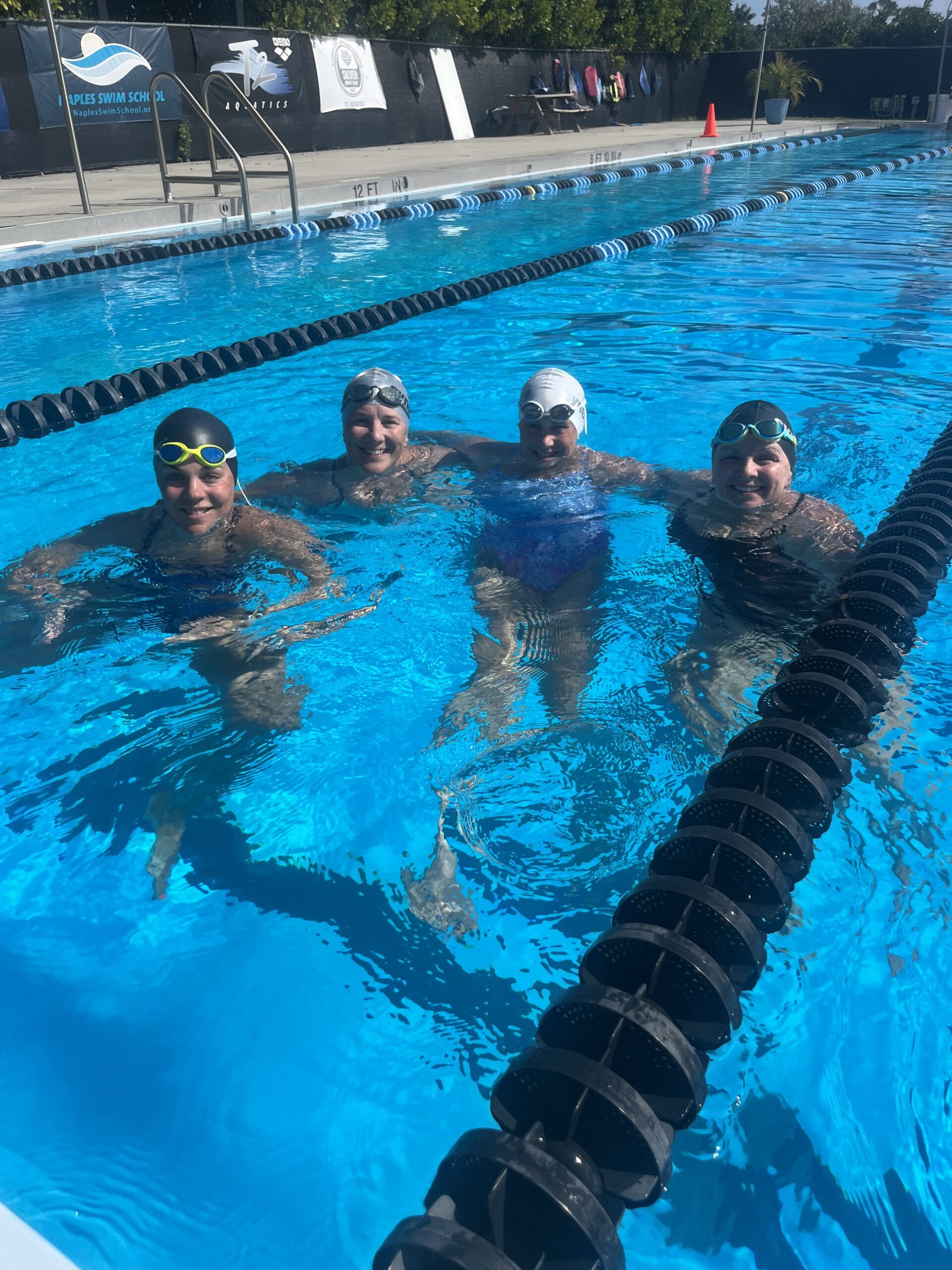 Picture of the author and teammates at swim camp